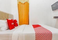 Bedroom 2 Hotel O Penginapan Griya Asri Syariah