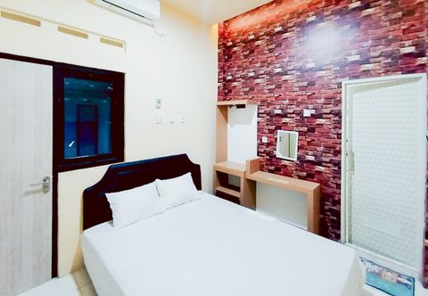 침실 VIP Co-Living Syariah RedPartner