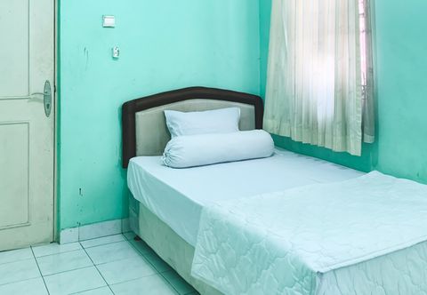 ห้องนอน Surya Inn Syariah Cikarang RedPartner