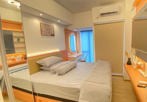 Phòng ngủ M-Town Residence Tower Bryant by Betah Banget Group