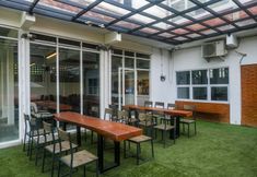 Common Space 3 Urbanview Hotel Syariah Astungkara Space Sleman by RedDoorz