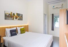 Bedroom 2 Urbanview Hotel Syariah Astungkara Space Sleman by RedDoorz