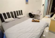 Bedroom 6 Sky House BSD by Mizu Rooms