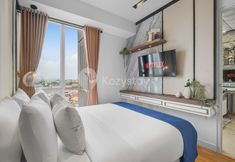 Bedroom 2 Mardika by Kozystay