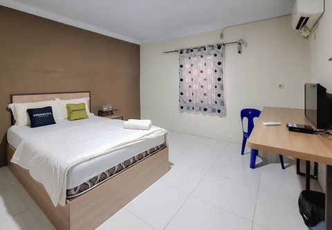 ห้องนอน Urbanview Syariah Sweet Home Cikarang