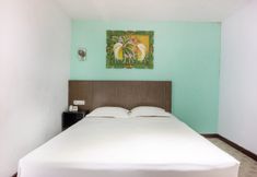 Bedroom 2 Hotel O Makassar near Losari Beach formerly Ocean View Hotel