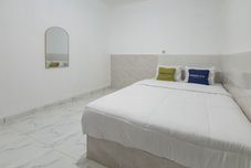 Kamar Tidur Urbanview Aurel House Cirebon