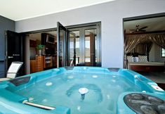 Bedroom 4 at Waterfront Whitsunday Retreat - Adults Only