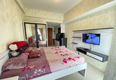 寝室 5 Tamansari Mahogany Apartement By Cozy