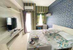 寝室 6 Tamansari Mahogany Apartement By Cozy