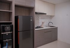 Common Space 5 Cozy Studio at Tamansari Bintaro Mansion Apartment By Travelio
