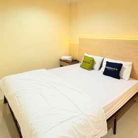 Bedroom 1 Urbanview Hotel Ling near Jawa Timur Park 2, Hotel Villa Kakak Adek