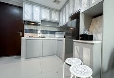 Common Space 5 Comfortable and Nice 2BR Apartment at Daan Mogot City By Travelio