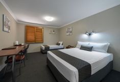 Bedroom 2 Cosmopolitan Motel & Serviced Apartments