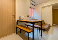 Common Space 5 Brand New 1BR Apartment with Working Room at Meikarta By Travelio