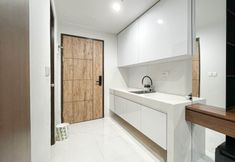 Common Space 5 Modern Studio at Delft Ciputra Makassar Apartment By Travelio