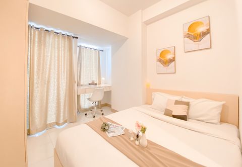 Kamar Tidur Enjoy Living and Minimalist Studio at Tokyo Riverside PIK 2 Apartment By Travelio