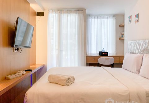 Bedroom Homey and Tranquil Studio at Tokyo Riverside PIK 2 Apartment By Travelio