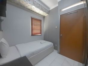 Bedroom 4 Cozy Stay 3BR Gateway Ahmad Yani Cicadas Apartment By Travelio