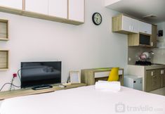 Bedroom 2 Tidy and Comfort Studio Apartment Springwood Residence Tangerang By Travelio