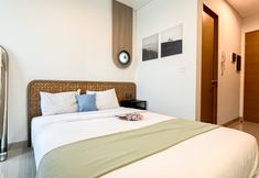 Bedroom 2 Fully Furnished Studio Room Apartment at Ciputra World 2 By Travelio