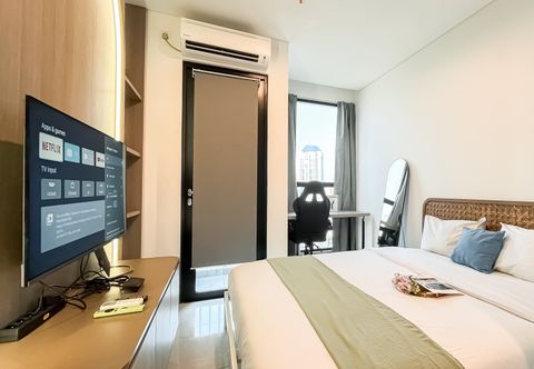 Bedroom Fully Furnished Studio Room Apartment at Ciputra World 2 By Travelio
