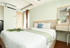 Bedroom 2 Homey and Minimalist Studio Apartment Amethyst By Travelio