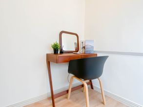 Common Space 4 Cozy and Warm 1BR with Makeup Room at Meikarta Apartment By Travelio