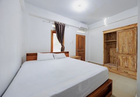 Bedroom Soka Asri Guest House near Bali Zoo RedPartner