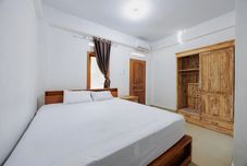 Bedroom Soka Asri Guest House near Bali Zoo RedPartner