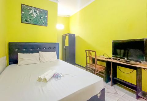 Bedroom WILUDJENG Guest House near Alun Alun Sragen Mitra RedDoorz