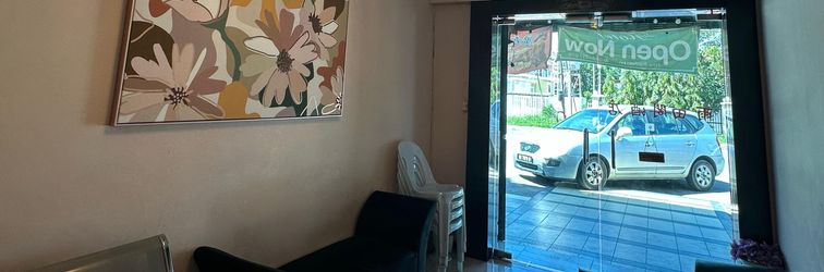 Lobi Hotel O Rainfield Inn