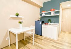 Bedroom 5 Soft Minimalist Studio Room at Apartment Meikarta By Travelio