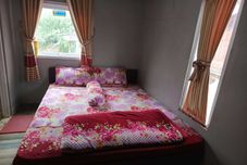 Bedroom OYO 94702 Putra Family Homestay Sikunir