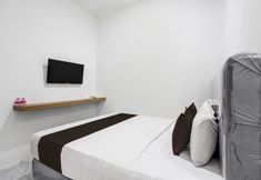 臥室 5 Capital O 94734 Barra Residence