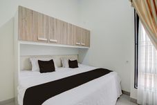 침실 OYO 94758 Kamila House