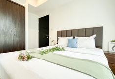 Bedroom 2 Monochrome Style 1BR at Apartment Branz BSD City By Travelio