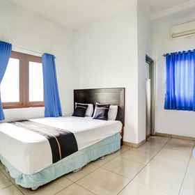 Bedroom 1 OYO 94780 Blessing Homestay, Hotel Mandjha dan Prive Ivan Gunawan Surabaya