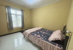 Bedroom 5 OYO 94841 Alodia Homestay Family