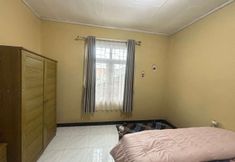 Bedroom 3 OYO 94841 Alodia Homestay Family