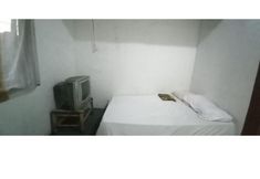 Phòng ngủ 4 OYO 94801 Pad Guest House