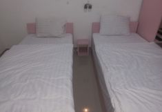 Phòng ngủ 5 Capital O 94901 Kostel Naga