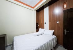 침실 6 Amore Guesthouse Syariah Mitra RedDoorz