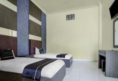 침실 6 Hotel O near Universitas Widya Dharma formerly Nugraha Residence