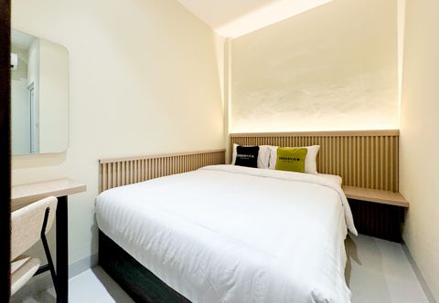 침실 Urbanview Rumah Tamu Citarum near RS Panti Wilasa Semarang