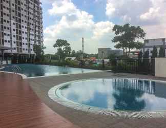 Lobi 2 Simply Look and Homey 1BR Oasis Cikarang Apartment By Travelio