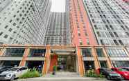 Bangunan 5 RedLiving Apartemen Transpark Juanda - F88 Tower Jade