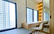 Bedroom 3 Homey and Warm Studio Pollux Chadstone Apartment By Travelio