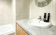 In-room Bathroom 6 Best Homey and Cozy 1BR at 25th Floor Vasanta Innopark Apartment By Travelio