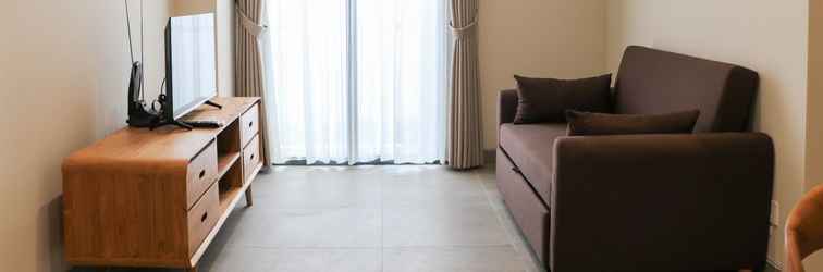 Lobby Homey and Comfortable 2BR Menara Jakarta Kemayoran Apartment By Travelio